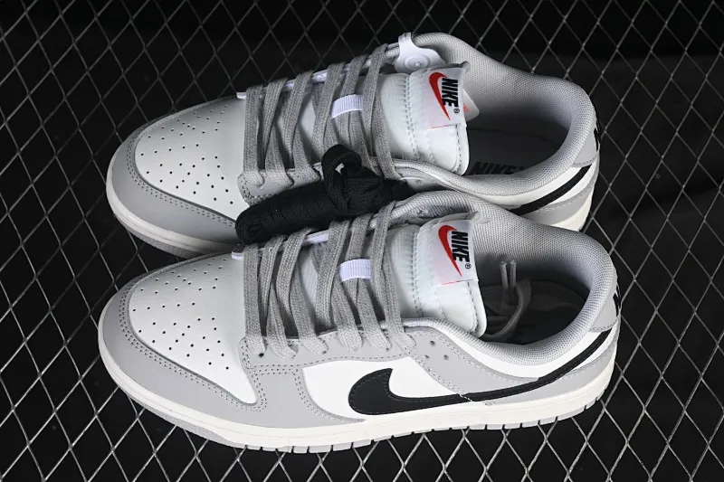 All categories Nk SB Dunk series Nk SB Dunk Low low-top sneakers Nike SB Dunk Low white, black and gray low-top casual sneakers IB3079-101